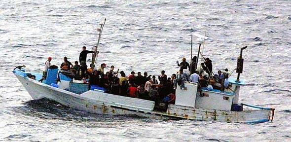 Asylum seekers on a small boat